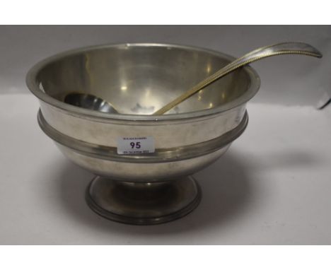 A Thomas Willaims pewter punch bowl with a large ladle