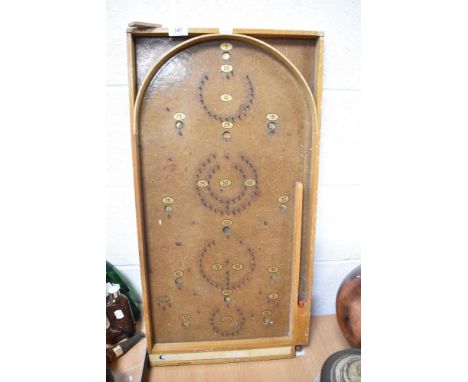 An early 20th century bagatelle game board
Appears to function as it should, lamp not included and image deleted.