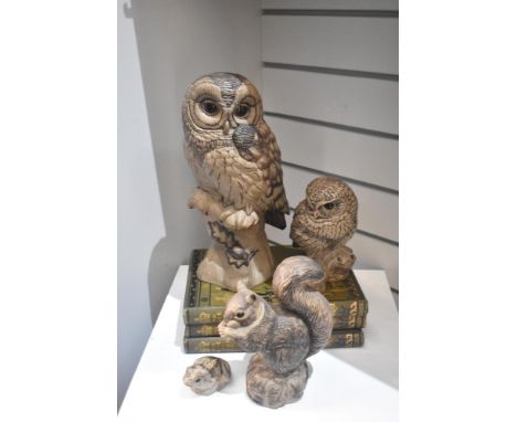 Four Poole Pottery animal figure studies including a large owl, little owl, squirrel and a frog