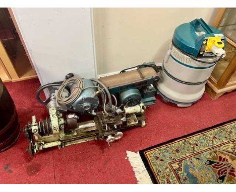 A Myford hobby lathe, with motor, together with a Draper belt and disc sander, and a Makita 110V industrial vacuum