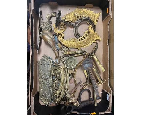 A collection of metal ware to include a cast brass door knocker in the form of a dolphin, cast brass finger plates, and vario