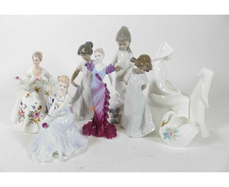 A collection of porcelain figures of ladies, to include Coalport Ladies of Fashion 'Bewitching' and 'Gail', h.22cm; two Nao f