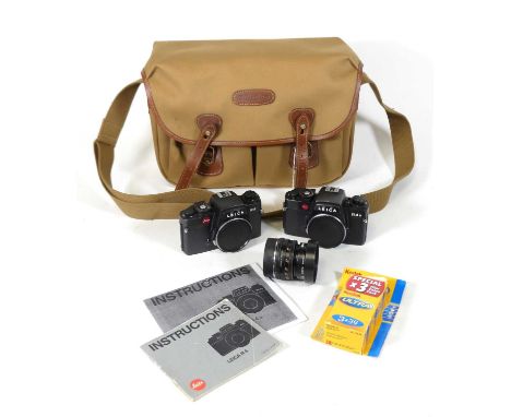 A Leica R4 camera, togeteher with a Leica R4s, and a Leitz Wetzlar 2759053 Summicron - R lens, in Billingham canvas camera ba