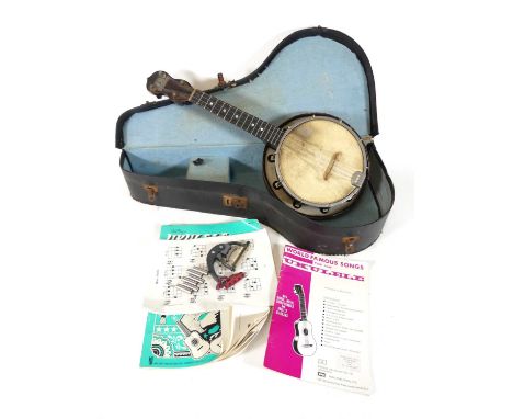 A mid 20th century George Formby ukulele banjo, in fitted case