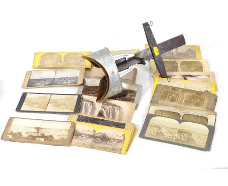 An early 20th century Underwood &amp; Underwood stereoscopic viewer; together with a small collection of viewing cards 