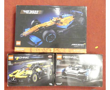 A McLaren 2022 Formula 1 Lego Technic set; together with a McLaren Senna; a Bugatti set 42151