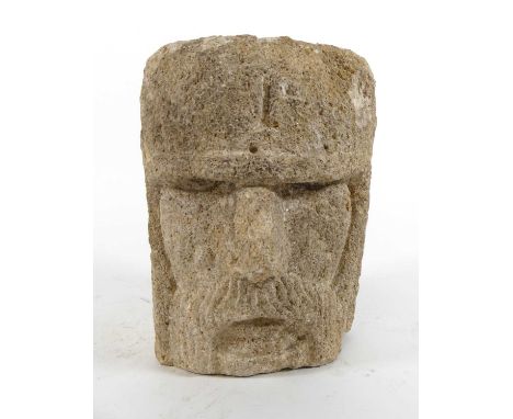 A weathered reconstituted stone corbel, in the medieval style, height 20cm
