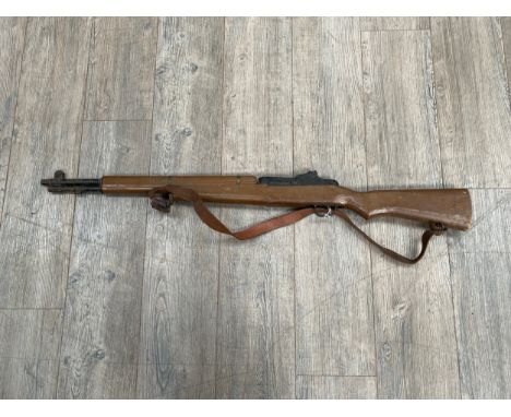 A model of a M1 Garand, reputedly a prop from the Band of Brothers series. Not subject to regulation. 