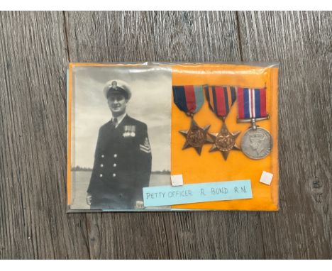 A WWII medal group of three consisting of 1939-45 and Burma stars and War Medal, issued to Petty Officer R. Bond R.N., with p