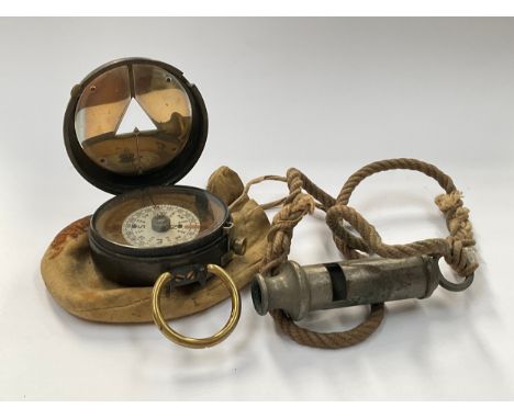 A WWI S Mordan &amp; Co military compass together with an ARP whistle 