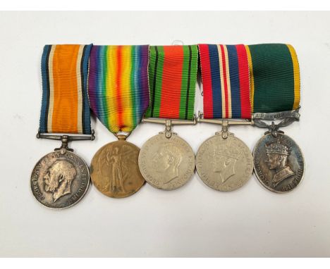 A WWI and WWII medal group of five consisting of WWI pair named to 53997 PTE. E. MULLERY MANCH. R., WWII Defence Medal and Wa