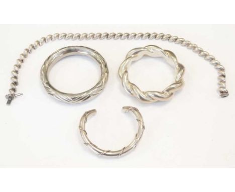 925 Sterling necklace of twisted design, 41.5cm long, together with a similar bangle, white metal torque bangle and plated ba