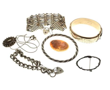 Assorted silver and white metal jewellery, comprising: silver bangle, silver gate-link bracelet, charm bracelet, silver locke