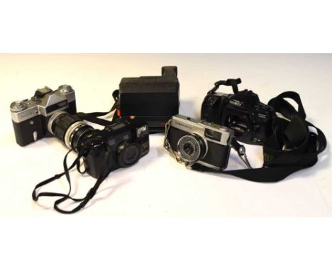 Quantity of cameras and lenses to include; Zenit-E, Polaroid Supercolour 635 CL, Olympus Trip 35, etc