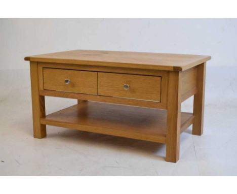 Modern light oak low side table with single drawer over shelf, 85cm x 54cm x 43cm high