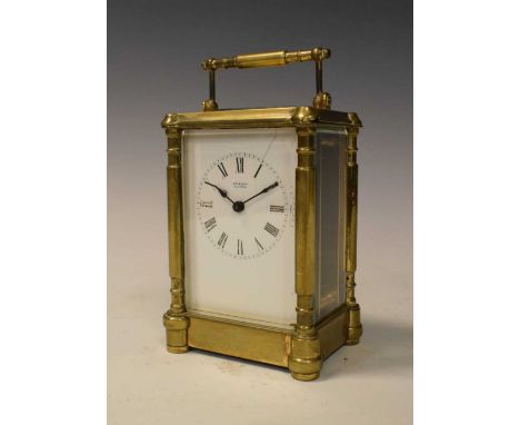 Brass carriage clock retailed by Grindon, Clifton, with white Roman dial and timepiece movement in column case, 13cm excludin