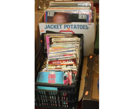 A box of assorted 12" vinyl, to include Meatloaf Bat out of Hell, Madonna You Can Dance, Wings Greatest Hits, The Housemartin