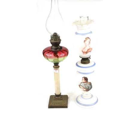 An early 20th century French opaline glass oil lamp, the shade printed with Josephine, and the body printed with Napoleon, he