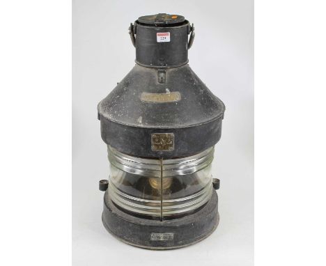 An early 20th century black painted galvanised steel ship's lamp bearing a label for Masthead, another for Seahorse trademark