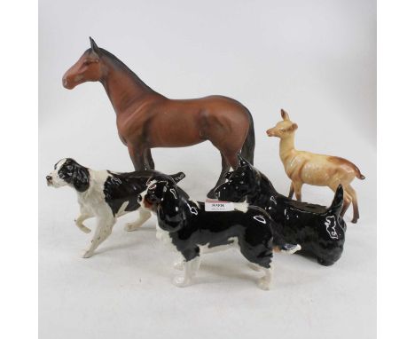 A collection of five Beswick animal figures to include The Winner, 2421, chestnut matt finish, height 24.5cm, three dogs and 