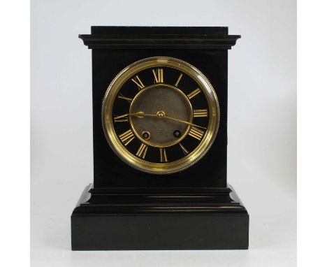 A Victorian black slate cased mantel clock, the slate chapter ring with incised gilt painted Roman numerals with a Ting Tang 