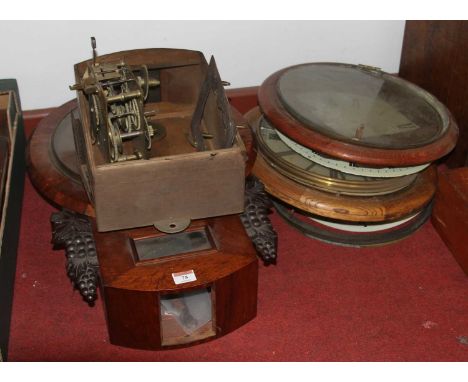 A collection of assorted wall clock parts to include a 19th century mahogany cased drop trunk wall clock (case and movement, 