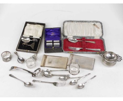 A collection of miscellaneous items, to include a silver fork and spoon, various silver plated items to include six apostle s