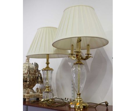 A brass mounted cut glass table lamp of ovoid pedestal shape, height including shade 79cm, together with another brass mounte