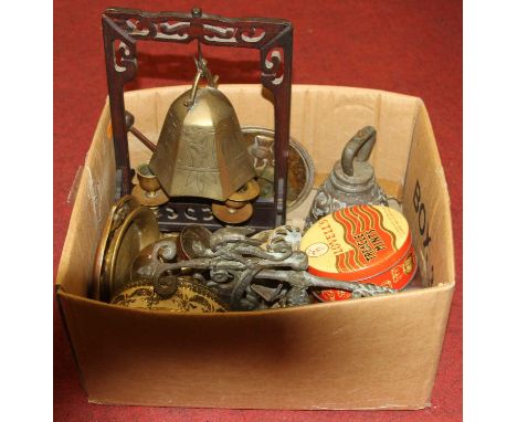 A collection of miscellaneous items to include a brass temple type bell suspended from a mahogany surround with beater, easel