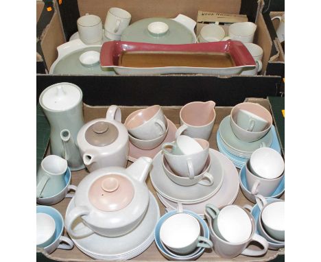 Two boxes of miscellaneous two-tone Poole Pottery tablewares, to include teacups and saucers, coffee pot etcAll pieces used b