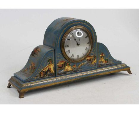 A 1920s blue lacquered mantel clock, with chinoiserie style decoration, the silvered dial with Roman numerals, having an eigh