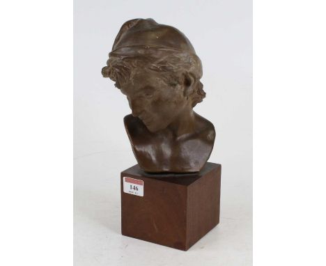 A painted pottery head &amp; shoulders portrait bust of a boy, mounted on square hardwood plinth, height 29cm