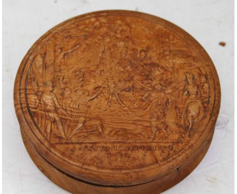 A Spanish 19th century carved circular pressed treen snuff boxIntact and in good condition. A few chips and small splits to t