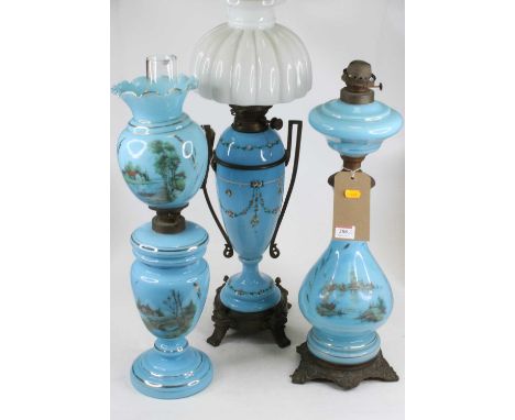 A late 19th century oil lamp having a clear glass chimney, opaline glass shade, to Hinks No. 2 Duplex bayonet fit burner on b