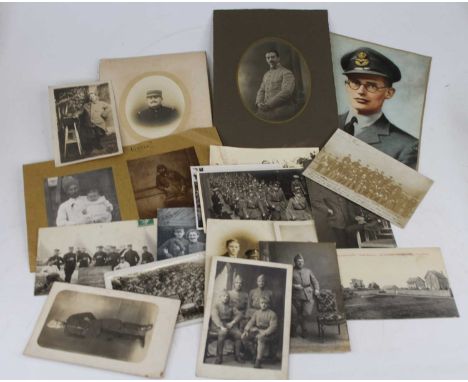 A collection of mainly early 20th century portrait photographs, to include military examples