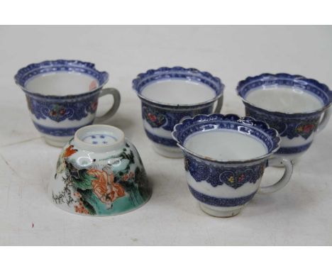 A Chinese porcelain tea bowl, enamel decorated with figures, six character rain mark to the underside, dia. 8cm, together wit