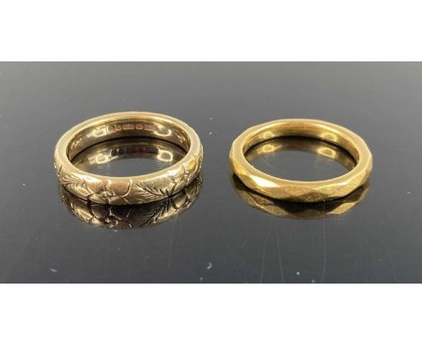 An 18ct gold wedding band, 4.5g, size J, together with a 9ct gold wedding band, 3.9g, size K (2)