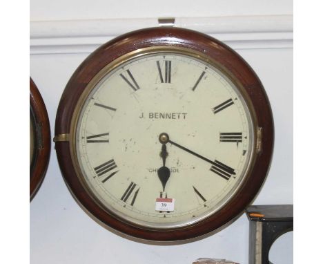 A Victorian mahogany wall clock having a 12" enamel dial with Roman numerals signed J Bennett, Cheapside, having a chain driv