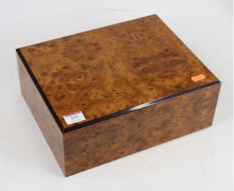 An Italian burr walnut veneered humidor, w.30cm, together with two pairs of cigar cutters, lighter, and novelty cigar puncher