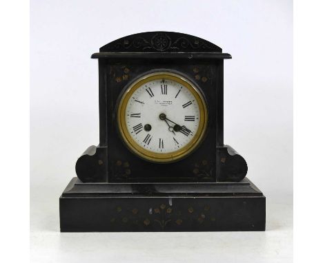 A Victorian black slate cased mantel clock, of architectural form, having an enamelled dial with Roman numerals and twin wind