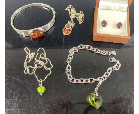 Assorted costume jewellery to include white metal and amber hinge bangle, amber set pendant, enamel pendant, pair amethyst se