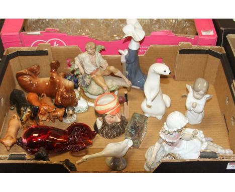 A box of miscellaneous items to include a Lladro Spanish porcelain figure of a reclining girl with basket of flowers, Lladro 