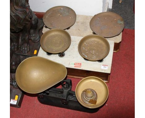 A set of Victorian marble topped mahogany postage scales, width 43cm, together with another set of postage scales, and pair o