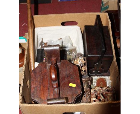 A box of oriental items to include red and gilt painted carved wooden wall pocket, hardwood three tier stacking box, walking 