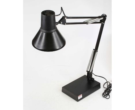 A black painted anglepoise style desk lamp, on a weighted rectangular base, height fully extended 73cm