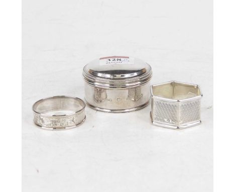 A modern silver trinket jar, the domed cover beaded rim; together with two silver napkin rings, gross 3.3oz (3)