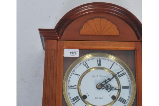 A James C Huntington Wall Clock Having A 31 Day Movement With Enamel Face Faceted Hands And Roma