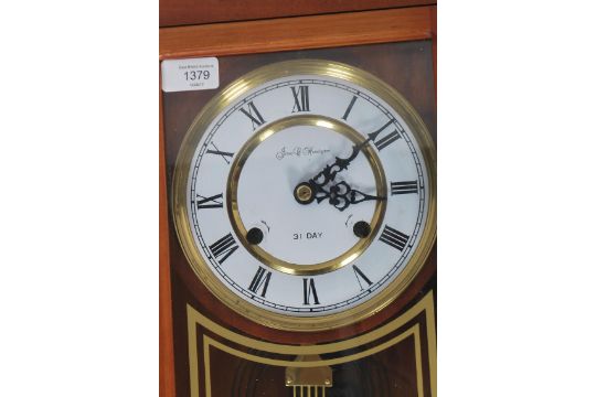 A James C Huntington Wall Clock Having A 31 Day Movement With Enamel Face Faceted Hands And Roma