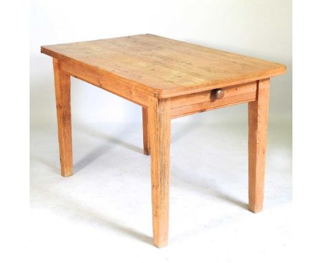 An antique pine dining table, containing a single drawer, together with a modern light oak framed wall mirror (2)121w x 74d x
