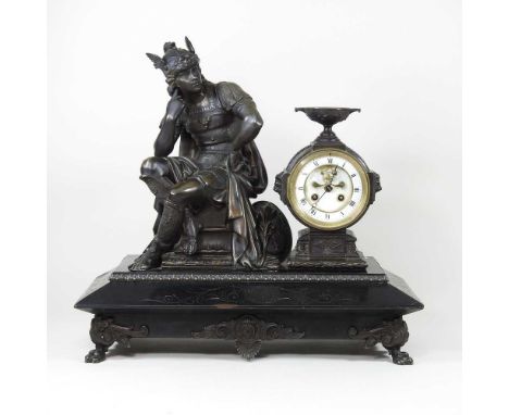 A 19th century gilt spelter figural mantel clock, surmounted by a figure of Hermes, with a white enamel dial and eight day mo